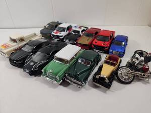 lot 124 image: Die Cast Model Car Collection with Classic Muscle Cars and Police Vehicles Mostly 132