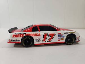 lot 126 image: Darrell Waltrip 1984-1986 97 Monte Carlo 1 of 6000 Parts America Bank With Key