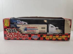 lot 157 image: Racing Champions 1999 NHRA Del Worsham Nitro Funny Car with Transporter 164 Scale Die Cast Set