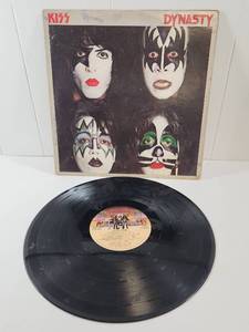 lot 244 image: KISS Dynasty LP Slip Cover And Love Gun Vinyl