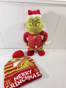 lot 298 image: Singing & Dancing Grinch Christmas Plush Toy and Knit Hat Set