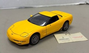 lot 901 image: Yellow Chevrolet Corvette Die-Cast Model Car