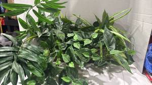 lot 2001 image: Artificial greenery arrangement in basket