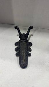 lot 2010 image: Cast iron beetle boot jack