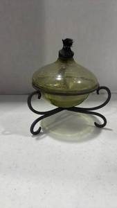 lot 2013 image: Olive green glass oil lamp with metal stand 7 inches tall