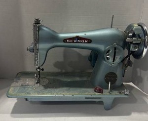 lot 2025 image: Sewmor Precision Deluxe Model 305 Sewing Machine