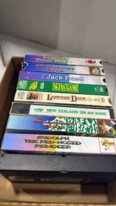 lot 2048 image: Collection of VHS Movies Including Disney and Family Films