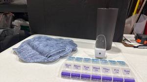 lot 2059 image: Toilet brush, pill organizer and bath pillow