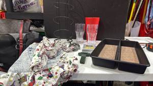 lot 2062 image: Jean apron, bottle openers, toilet paper holder and silverware tray