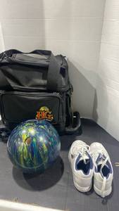 lot 2109 image: Custom bowling ball, rolling bag and size 6 shoes