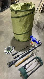 lot 2121 image: Collapsible gardening container with tools and sprinklers