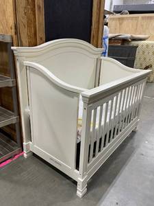 lot 3013 image: Off white wooden baby crib48 x 60 x 32 inwith Safety1st mattress(has crack in back piece of wood)