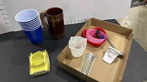 lot 4020 image: Plastic cups, mug, egg slicer, chip clips and more