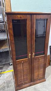 lot 4045 image: Cabinet with smoked glass doors ,adjustable shelves 57x28x20