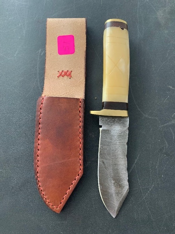 lot 51 image: Handcrafted Damascus Steel Knife Blade with bone handle and leather sheath approx 7.75 inches long Hunting Fishing