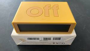 lot 257 image: FLIP Radio-controlled reversible LCD Alarm Clock, Yellow