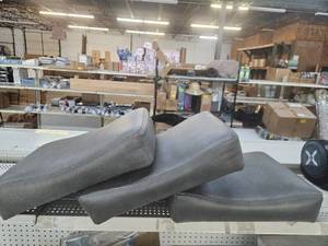 lot 519 image: Lot of 3 Faux Grey Leather Barstool Seats. SEAT TOPS ONLY. Approximate 16x12x3