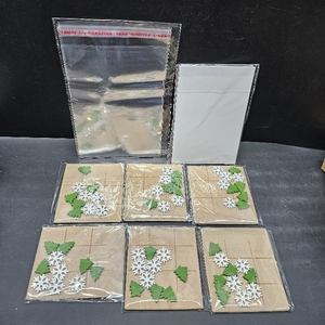lot 3378 image: Christmas-themed Tic-Tac-Toe game set featuring snowflake and tree shapes.