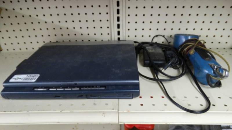 lot 10880 image: Toshiba laptop w charger and vintage phone