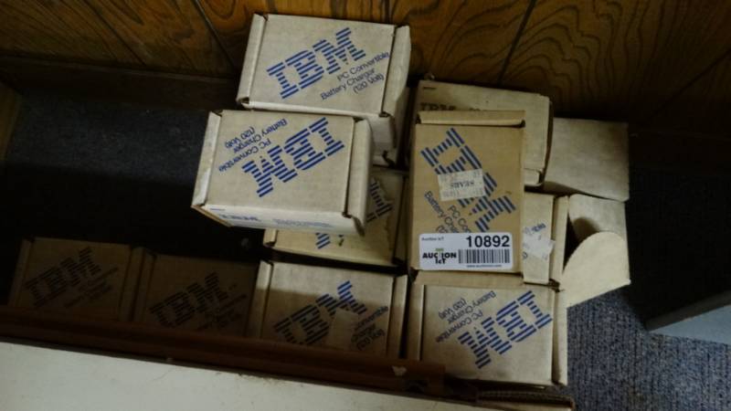 lot 10892 image: Lot of IBM convertible battery chargers.