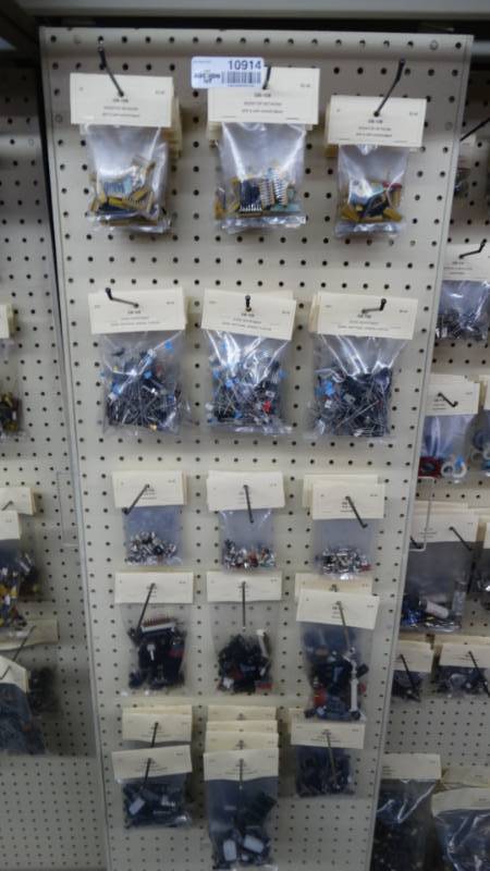 lot 10914 image: Big lot of resistor networks, diode assortment, trim caps, switch, assorted ics.