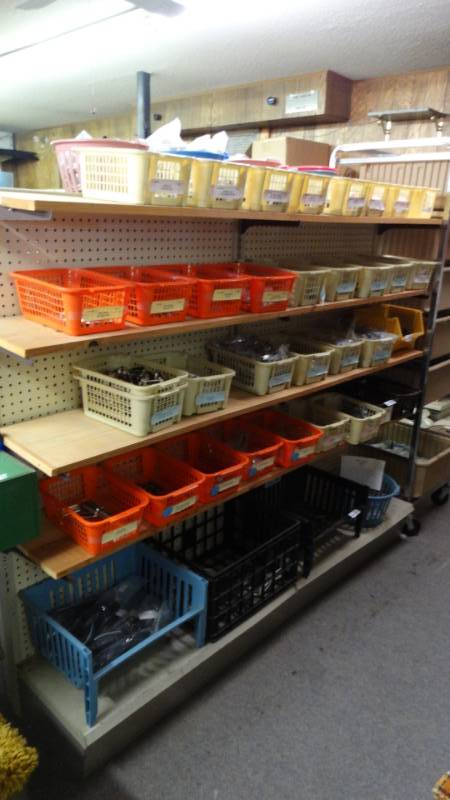 lot 10967 image: Double sided shelving unit. approx 6ft long 2 12ft wide. NO CONTENTS