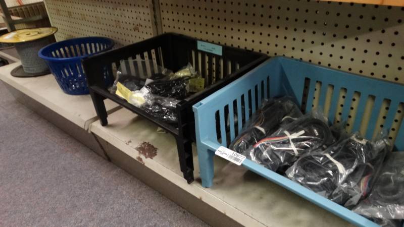 lot 10977 image: Lot of cables, baskets and spool of wire.