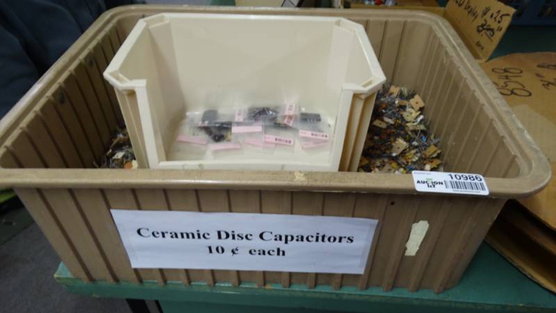 lot 10986 image: Tote of ceramic disc compacitors.