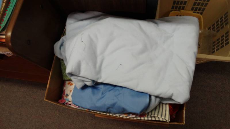 lot 17585 image: 2 boxes of fabric and yarn.
