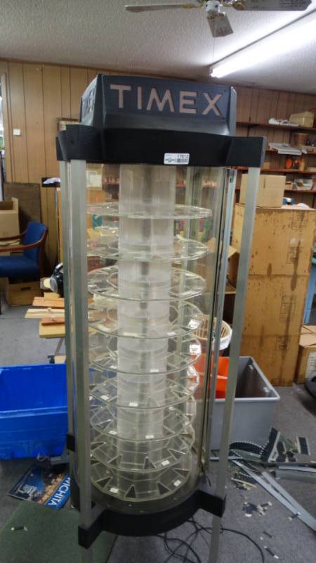 lot 17612 image: Timex spinning display case.