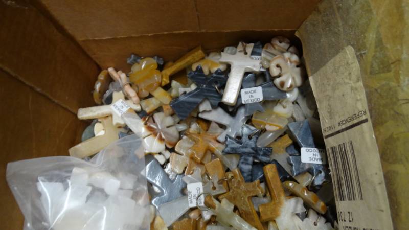 lot 17637 image: Box full assorted animals, cross neckalaces and more.
