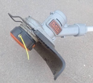 lot 13 image: Black & Decker 20V Cordless String Trimmer, Adjustable Telescopic Shaft, and Edger Guard, Lightweight with Battery & Charger - Tested, Works Well