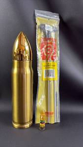 lot 16 image: Rifle Cleaning Rod and Raptor Pellets with Artillery Shaped Stainless Steel Beverage Thermos