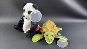 lot 19 image: Coca-Cola Collectible Plush International Animals with Mini Coke Bottles