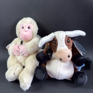 lot 20 image: Coca-Cola International Plush Monkey and Bull