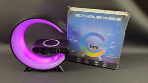 lot 36 image: Smart Light Sound Machine with Wireless Charging