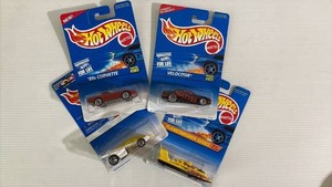 lot 56 image: (4) Hot Wheels Die-Cast Cars in Original Packaging