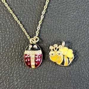 lot 74 image: Gold Tone Chain Necklace with Ladybug and Bee Charm Pendants
