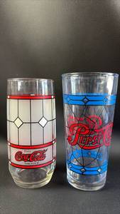 lot 77 image: (1) Coca Cola and (1) Pepsi Stained Glass Style Drinking Glasses