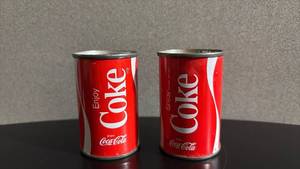 lot 252 image: Vintage Tin Coca-Cola Can Salt And Pepper Shakers - Approximately 2 12 Tall
