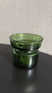 lot 265 image: Vintage Dansk Designs green glass candle holder, designed by Jens Harald Quistgaard in the 1960s