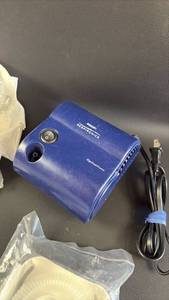 lot 319 image: Philips Respironics OptiHome Compressor Model 1060509 and Lots of NIP Accessories