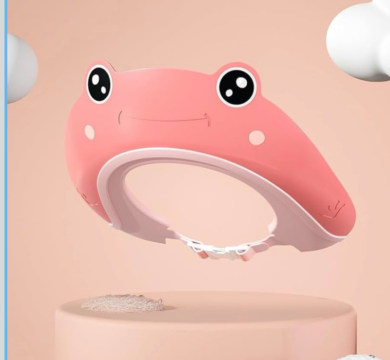 lot 2573 image: Generic Frog-shaped shower cap for baby (Pink), green - Retail $0