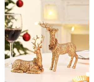 lot 3755 image: AOMOONOA 2Pcs Resin Reindeer Figurines for Christmas Decor Gold Tabletop Reindeer Statues Small Decorative Deer Figurines for Indoor Christmas Tabletop Mantle Decorations - Retail $0