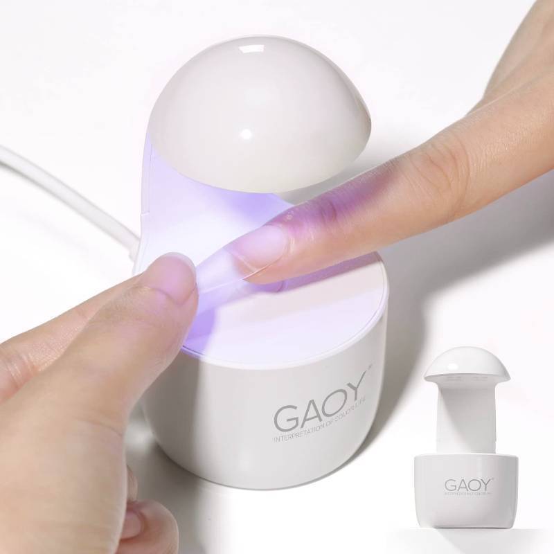 lot 16471 image: Mini UV Light for Gel Nails, Small Curing Light, Eggshell LED Nail Lamp, Fast Curing, White - Retail $6