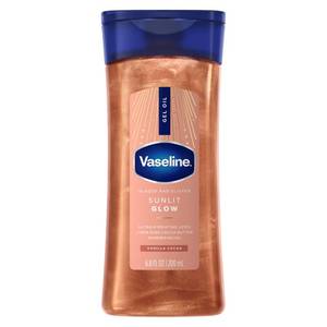 lot 56820 image: Vaseline Glazed and Glisten Sunlit Glow Body Gel Oil Vanilla Cocoa Shimmering with Ultra-Hydrating Lipids and 100% Pure Cocoa Butter, 6.8 Oz - Retail $7
