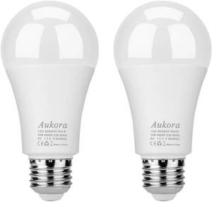 lot 21254 image: Aukora Dusk to Dawn Light Bulb, 12W (100-Watt Equivalent) Smart Sensor Light Bulbs Super Bright E26 Automatic OnOff Security Lights OutdoorIndoor for Porch Garage Garden Patio(Cool White 2 Pack) - Retail $11