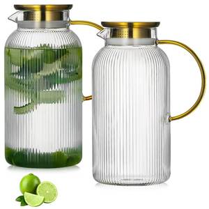lot 21305 image: Buaic 2 PACK Glass Pitcher with Lid, 68 oz 2 Liter Classic Vertical Stripes Water Pitcher with Handle,Glass Water Carafe for Cold Brew, Coffee, Lemonade, Iced Sun Tea,Beverage,Heat Resistant - Retail $30
