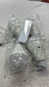 lot 11024 image: Sunter Set Of 4 Multi-Socket Rechargeable Light Bulbs w Remote