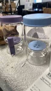 lot 10032 image: Genicook Hourglass Pickle & Olive Jar with Fork